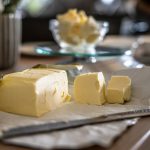 sliced cheese on clear glass plate