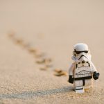 Stormtrooper minifigure walking on the sand