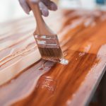 brown wooden handle brush on brown wooden table