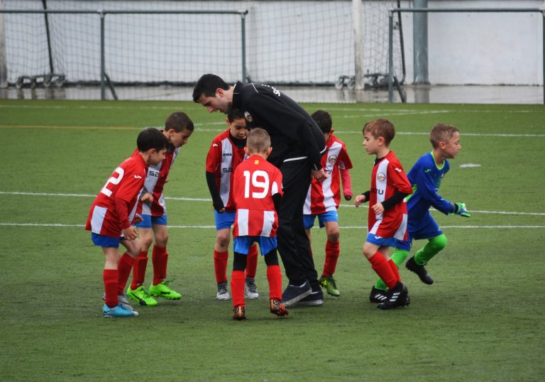 children playing soccer