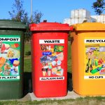 red yellow and green trash bins