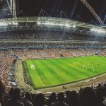 crowd watching football game inside stadium