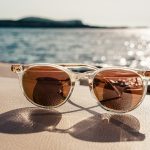 white framed brown lens sunglasses