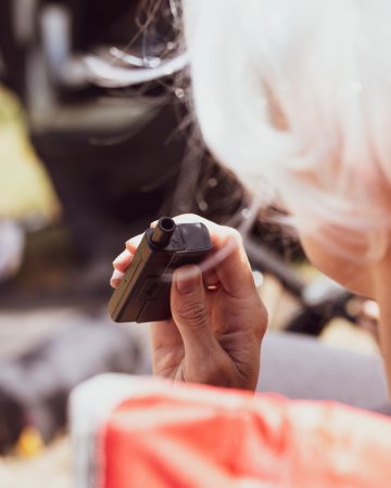 a person holding a remote control