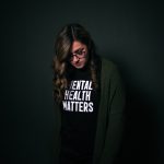 woman in black and white long sleeve shirt