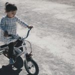 girl riding trike