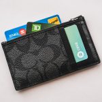 a wallet with credit cards sticking out of it