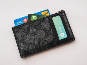 a wallet with credit cards sticking out of it