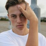 men's white crew-neck top close-up photography