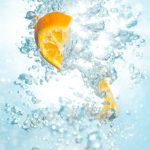 sliced orange fruits underwater