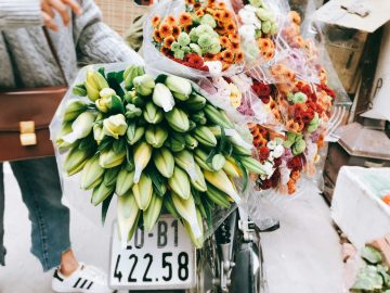 bouquet of flowers on bicycle