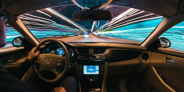 time lapse photography of man riding car