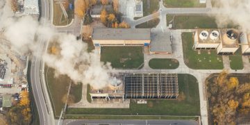 white smoke coming out from a window